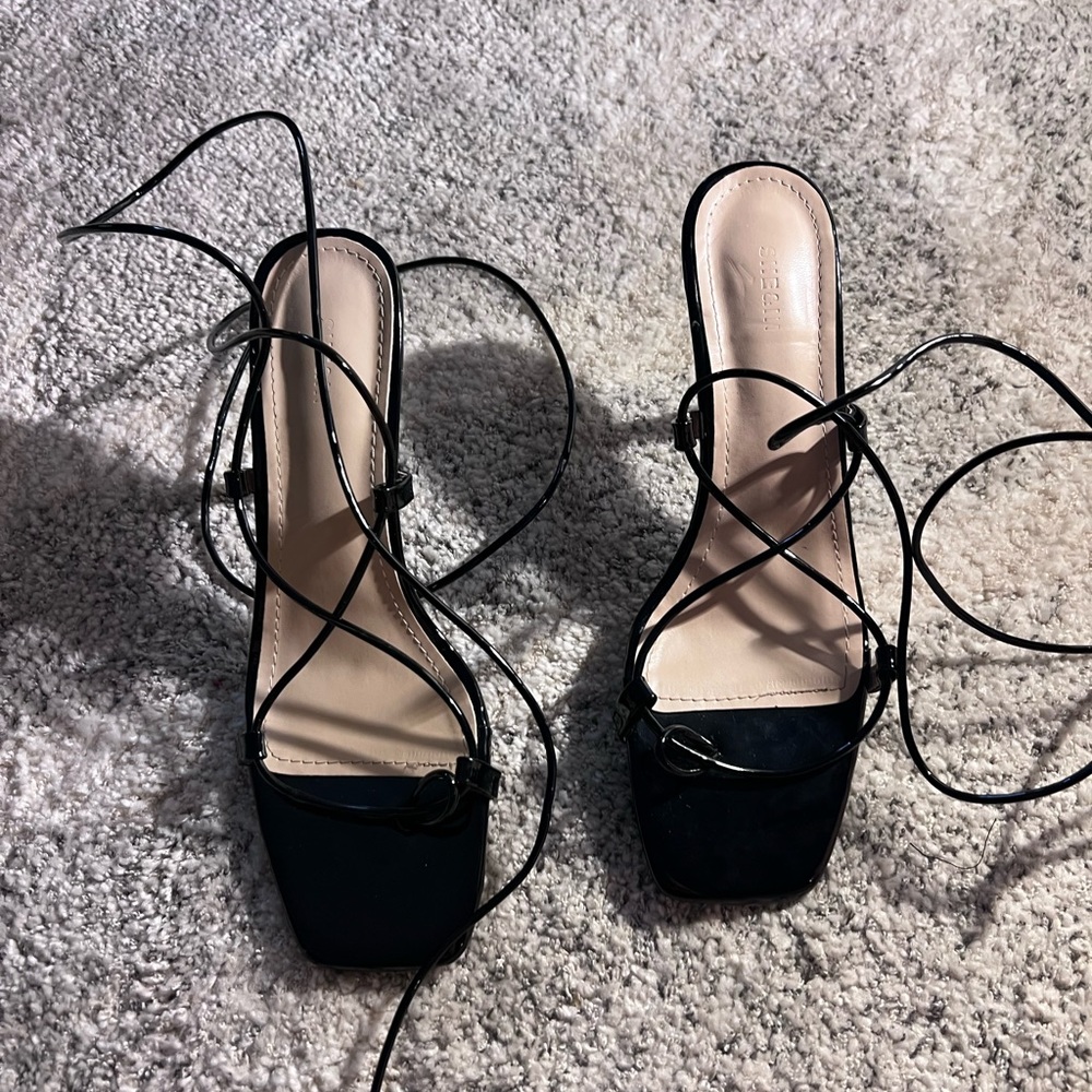 Black lace up heels.